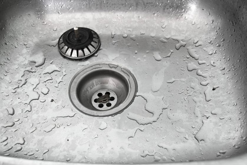 kitchen sink with air trap drains slowly